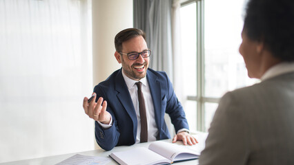 Concept of job interview, negotiations. The boss and the candidate during the job interview.