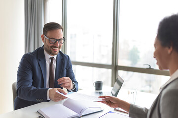 Concept of job interview, negotiations. Two managers during the business meeting