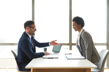 Business, job interview, career or negotiations concept, two employees on the meeting