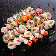 sushi on the black background