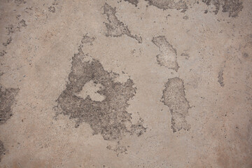 The cement wall background is getting old and dirty
