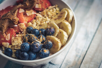 Buckwheat porridge with blueberries, strawberries banana and caramel cream