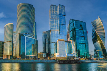 Obraz na płótnie Canvas Skyscrapers in the business center, financial district, sunny day, blue sky, empty space, Moscow city, Russia.