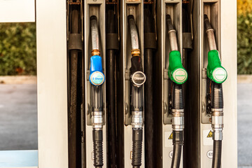 Close up of fuel nozzles in an old petrol station