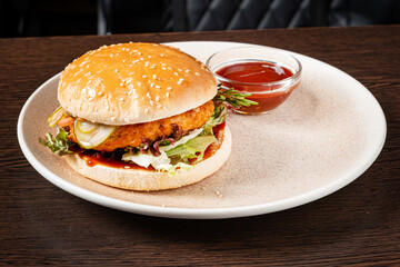 burger with sauce on plate