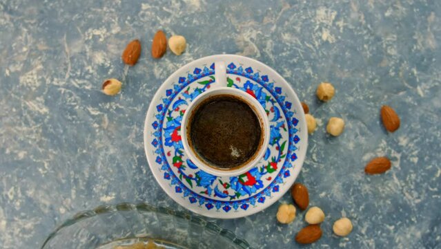 Turkish coffee and baklava on the table. Selective focus.