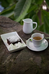 Coffee served with a brownie 