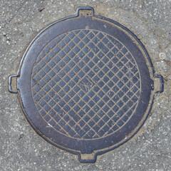 manhole cover in the street