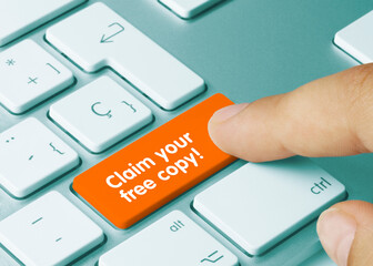 Claim your free copy! - Inscription on Orange Keyboard Key.