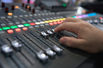 Professional audio mixing console. ​Mixer. Pro audio mixing board faders and knobs. Static shot...