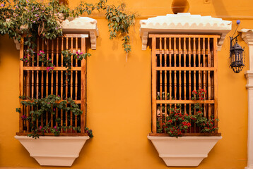 Windows with wooden bars in Cartagena - obrazy, fototapety, plakaty