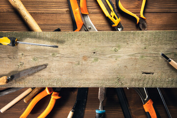 Construction tools with a pattern on a wooden table