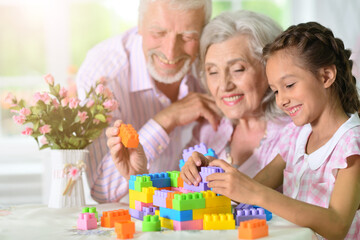 happy family playing with blocks