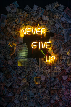 Yellow Neon Lights Background With Sign NEVER GIVE UP