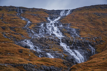 Waterfall in Saksunardalur valley located in Streymoy Faroe Islands. November 2021
