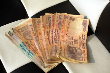 crumpled banknotes indian rupees paper money close up