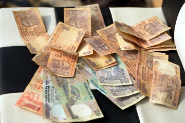 crumpled banknotes indian rupees paper money close up