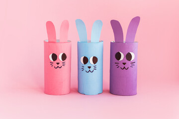 Holiday easy DIY craft idea for kids. Toilet paper roll tube toy's cute rabbit's on pink...