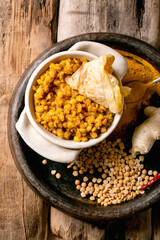 Traditional indian yellow pea food dal with roti bread