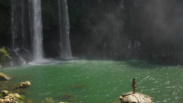 Female Tourist Enjoing the View of Misoh-Ha Waterfall in Chiapas, Mexico