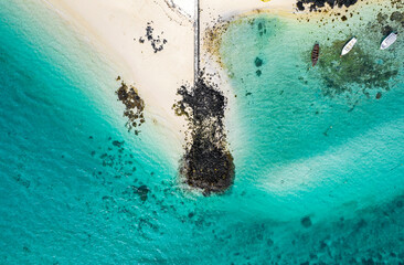 Aerial view of a pier located on the south east coast of Mauritius at Pointe d'Esny Beach
