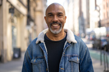 Mature black man in city smile happy face portrait