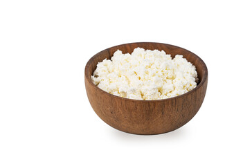 Delicious and nutritious homemade cottage cheese in a wooden bowl on a white background. Concept healthy and diet food. Copy space