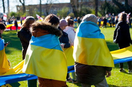 Dusseldorf, Germany - Saturday 19 2022: The demonstration in support of Ukraine and against the Russian aggression. Protesters against Russia's war in Donbas, Ukraine. - Powered by Adobe