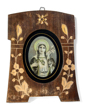 Virgin Mary the holiest woman in oval memorial photo. Object white isolated. The ancient retro image of the Virgin Mary is in a damaged aged wooden carved frame.