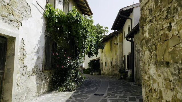 POV point of view shot of walking trough old beautiful town Tuscany like in Goriska Brda Slovenia