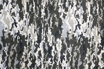 Fabric with texture of Ukrainian military pixeled camouflage. Cloth with camo pattern in grey,...