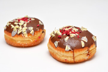 donuts with chocolate close-up on a white background