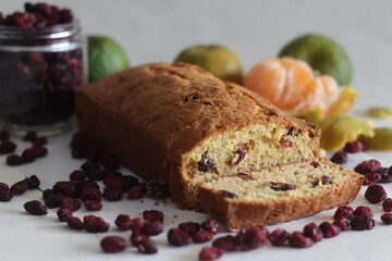 Sliced Orange cranberry bread loaf. An orange flavoured quick bread with dried cranberries. A...