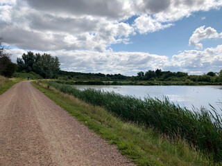 Fototapeta na wymiar Landscape photo of lake and sky in summer