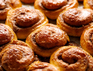 Traditional sweet cinnamon buns kanelbullar, close up view