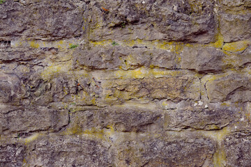 Texture of a stone wall. Old castle stone wall texture background. Stone wall as a background or texture. Part of a stone wall, for background or texture
