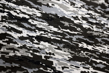 Fabric with texture of Ukrainian military pixeled camouflage. Cloth with camo pattern in grey,...
