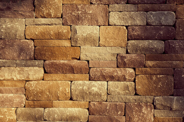 Obraz premium Texture of a stone wall. Old castle stone wall texture background. Stone wall as a background or texture. Part of a stone wall, for background or texture