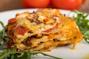 lasagna on a blue plate