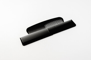 Pair of black opposing hair combs