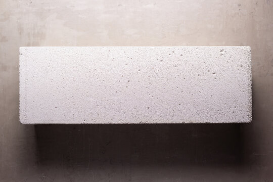 Aerated concrete block background at wall. Lightweight concrete texture