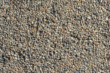 small road stone background, dark gravel pebbles stone texture seamless texture

