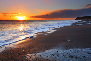 Sunrise at Blast Beach looking towards Chourdon Point, Seaham, County Durham, England, UK.