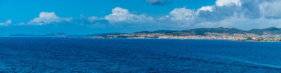 Fototapeta na wymiar A panorama view from the cruise terminal across the Vigo estuary in Vigo, Spain on a spring day