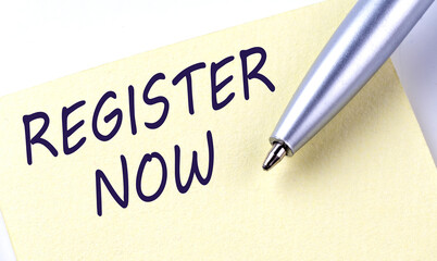 Sticky Note Message REGISTER NOW with pen on white background