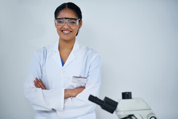 Confident Ive found the cure. Cropped portrait of an attractive young female scientist working in her lab.