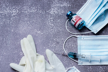 Fototapeta na wymiar Medical waste from vaccinations, medical gloves, syringes, masks.