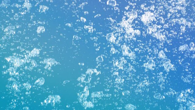 Abstract natural full-frame rising gas bubbles on blue background. Concept loop animation for cleaning and body care product backdrop packshot template, hydrogen power and pure drinking water showcase