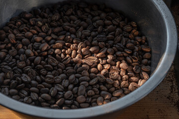 fresh and toast coffee beans in a bowl