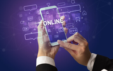 Hand using smartphone with social media concept